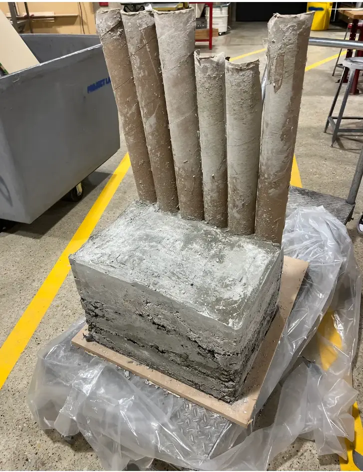 Cardboard tubes standing in the fresh concrete cast