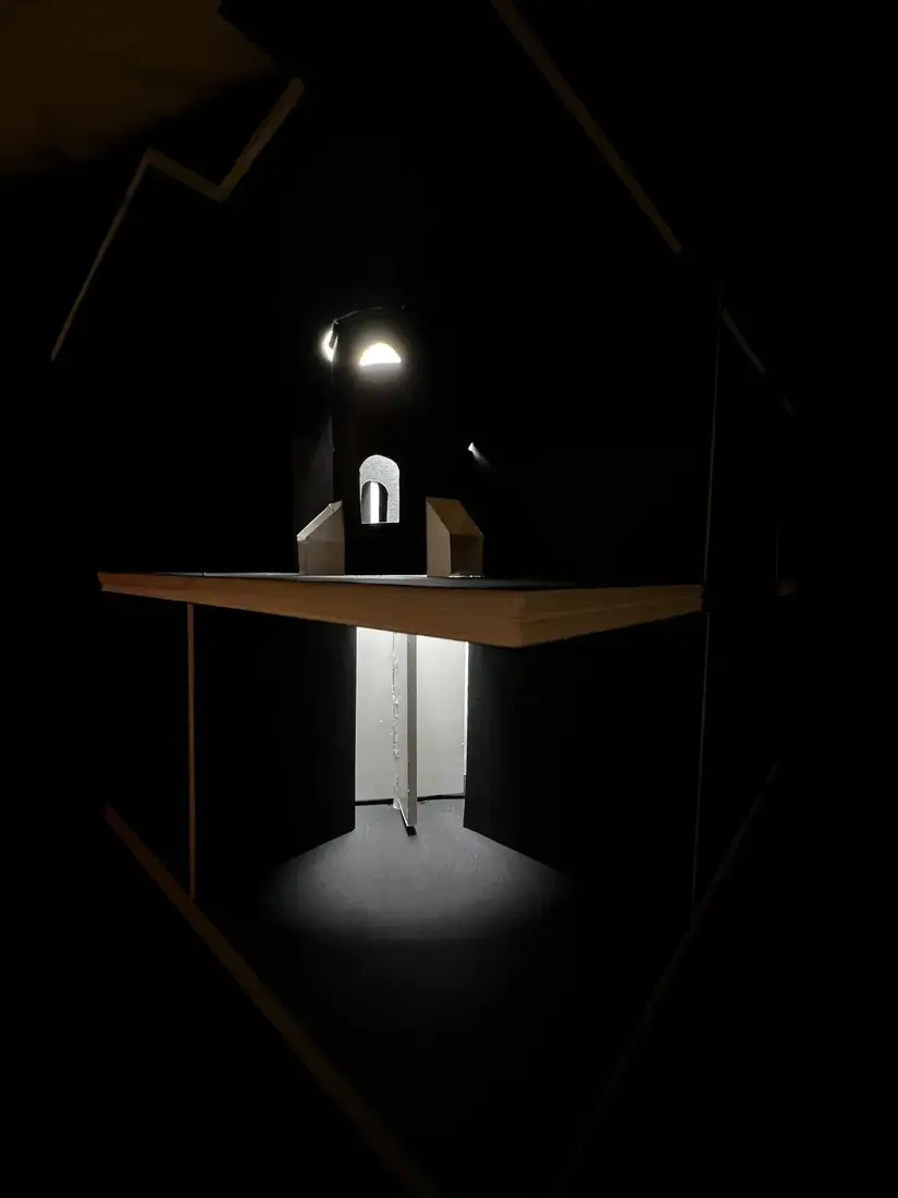 Model photograph of light pooling beneath a well